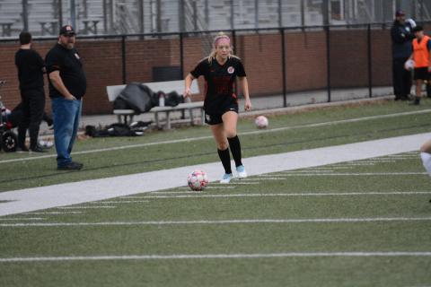 Junior midfielder Piper Phillips looks to move the ball up the right wing during the 5-3 home loss to the Lady Indians of Towns County on Feb. 27. 