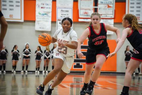 Junior guard TK Smith (23) drives into the lane as she was the co-leading scorer for the Lady Dogs with 17 points as Hart defeated the Lady Indians of Stephens County on Feb. 2, 55-43. 