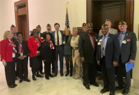 Senator Jon Ossoff with representatives from Veterans of Foreign Wars in 2023.