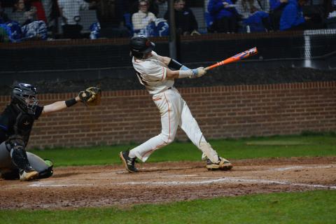 Freshman second baseman Crew Franklin collects a hit during the 7-5 win in game two of the double header against the Warriors of Oconee County on March 7.