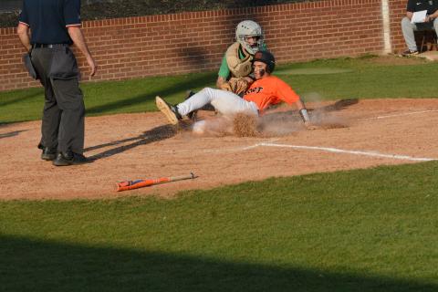 Freshman outfielder Kaidyn Allen slides safely into home plate during the 11-5 loss to Franklin County on March 14.