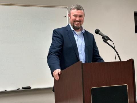 Republican candidate  for sheriff Chris Carroll speaks to a crowded house at the GOP candidate forum March 14. Carroll will take on former sheriff’s deputy Tracy Mize who is running as an independent. 