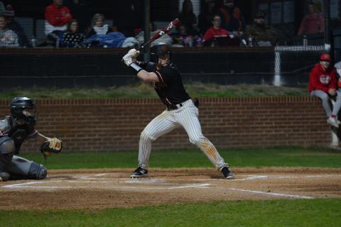 Senior outfielder Kanyon Coulter hits a three run homerun in the 11-7 game three loss to Hebron Christian. 