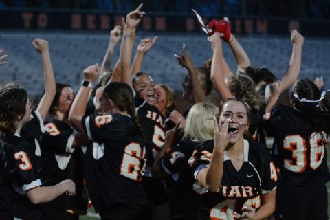 The Seniors celebrate after a big 28-7 win over the Juniors in the 2024 Powderpuff game on March 21 in Herndon Stadium.