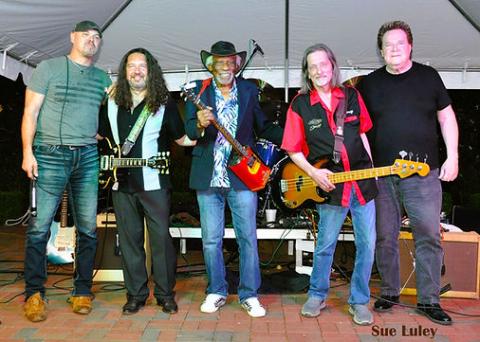 Mac Arnold (center) and his band Plate Full O’ Blues will perform at High Cotton Music Hall this Saturday. 