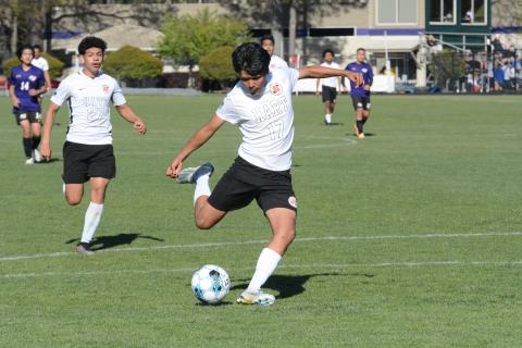 Freshman forward Manuel Sigala (right) nets a goal in the 8-0 win over Athens Christian April 5, while Eric Barrientos (left) nets a goal in the 5-1 loss over Hebron Christian April 9. 