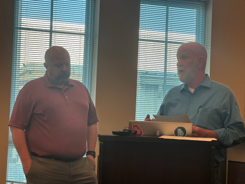 Councilman Tray Hicks (right) and DDA Director Jason Ford  make a presentation on annexation. 