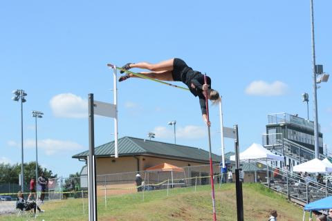 Pictured is senior pole vaulter Amelia Johnson as she captured a region championship in her respective event.
