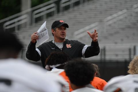 Dogs head coach Cory Dickerson addresses the team after their seventh spring practice on May 13 in Herndon Stadium.