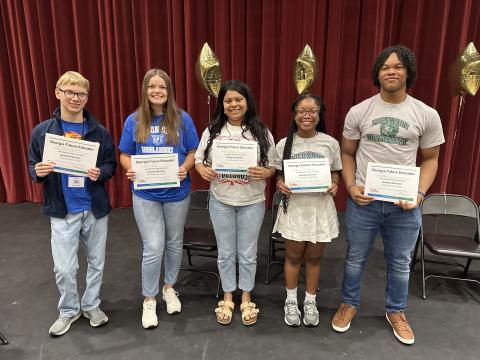 Pictured, from left to right, are Hart County High School seniors Sawyer Boyd, Gracie Cook, Kerrigan Johnson, Au’Brionna McIntosh, and Micah Reese who participated in the local Georgia Future Educators Signing Day ceremony.