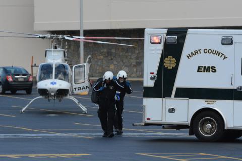 Helicopter Emergency Medical Service Technicians from LifeNet South Carolina touchdown in the Ingles parking lot near Belk to transport a victim from Monday’s horrific crash to Prisma Health in Greenville, S.C. Photo by Benjamin London