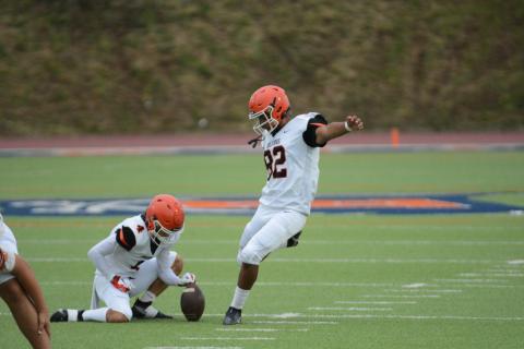 Sophomore kicker Ivan Delgado (92) prepares to kick the point after attempt in the 2024 Spring Game versus Habersham.
