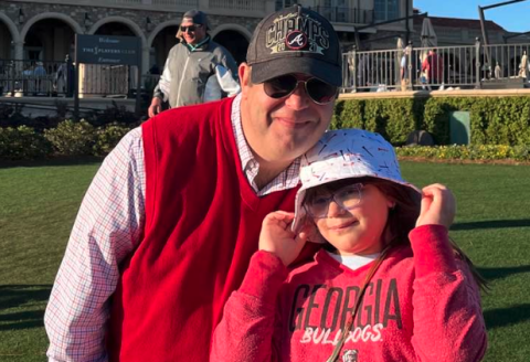 Vivian Fargason (right) on a date with her old man during the third round of the 2022 Players Championship at TPC Sawgrass. 