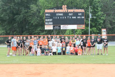 Pictured are the 30 plus campers alongside the HCHS softball players and coaches at the youth camp June 3-5. 