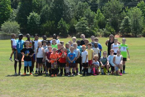 Pictured are the 30 campers along with the six coaches who helped coach and learn during the FUNdamentals Soccer Camp at the Bell Family YMCA on June 10-14.