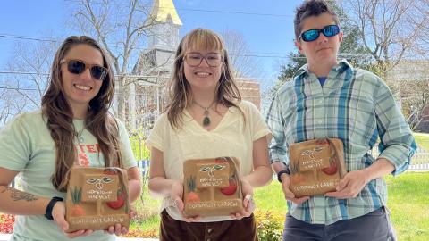 Hartwell’s Jennie Bosman, center, donated four pavers she designed and created to the Vickery House garden, poses with Morgan Southerland, Hometown Harvest coordinator, left, and Kelly West, director of UNG’s Appalachian Studies Center.