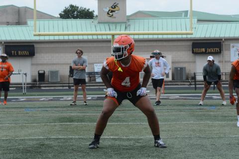 Senior linebacker DJ Groves awaits the snap during a Team versus Team at T.L. Hanna High School back on June 17, as he looks to be an impact player for the Dogs’ defense in 2024.