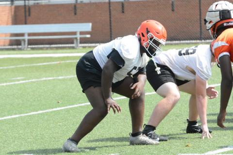 Senior offensive lineman Eykwan Hailey awaits the snap during a summer practice.
