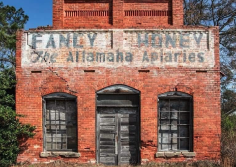 One of the most-photographed landmarks in Wayne County is the 124-year-old brick building in Gardi. Around 1940, Troy Fore Sr. purchased the iconic structure in which he operated The Altamaha Apiaries. In 1969 his son, Troy Jr., established Fore’s Honey Farms. Troy became an influential leader in the beekeeping industry. 