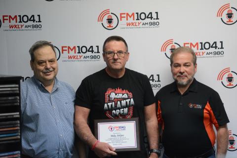 Pictured from left is Bryan Hicks, Mike Atkins, and Bruce Hicks during Atkins 40th anniversary at WKLY.