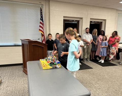 Students participating in the summer SAIL learning academy demonstrate what they learned over the summer. Pictured from left to right: Lincoln Seawright, 5th grader at North Hart Elementary and Millie Colson, 5th grader at South Hart Elementary.