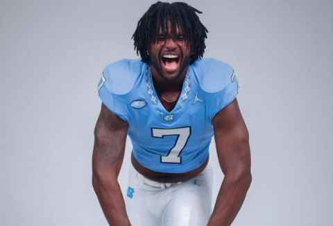 Fifth-year senior defensive end, Kaimon Rucker, poses during media day. 