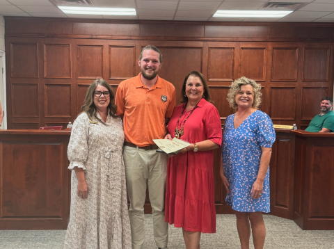 The Hart County Board of Education honored OneHartBeat Executive Director Bobbie Busha during its meeting Sept. 9. Pictured above (from left to right): Board chair Kim Pierce, Grayson Williams, Bobbie Busha, and Superintendent Jennifer Carter. 