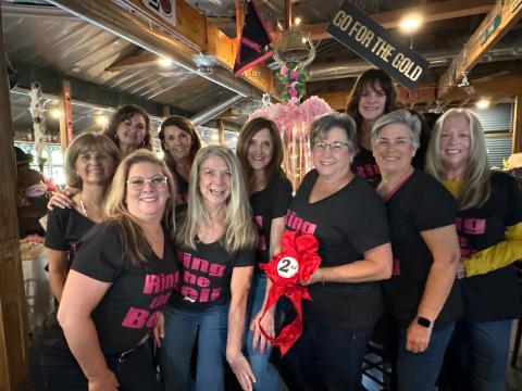 Pink Partini included table contests; one table consisted entirely of women who met through the event and “have been friends ever since.” Top row from left to right: Donna Koenig, Shannon Hyde, Terry White, Trudy Snyder, and Tanna Santangelo. Bottom row from left to right: Colleen Clark, Chrissy Warren, Renee Sabol, Hope Underwood, and Mary Cottingham.