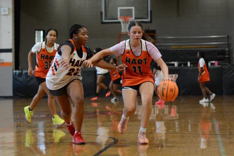 Senior guard TK Smith (left) and junior guard Maddie Carter (right) during a practice scrimmage on Oct. 24.