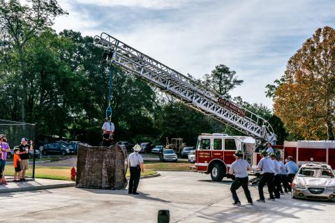 Hartwell firefighters demonstrate a confined space rescue during the grand opening of the city’s new fire station on Nov. 2. 