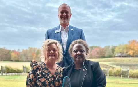 Pictured, seated, from left to right, are Hart County Charter System Superintendent Jennifer Carter and Dr. Veronica Johnson, this year’s Pioneer in Education, with Pioneer RESA Executive Director Tim Cochran, standing.