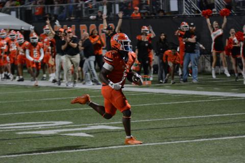 Senior running back Timothy Newton rushes for 77 yards and two touchdowns in the 29-9 win over rival Franklin County to clinch the Dogs spot in the state playoffs.