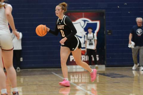 Senior guard Channing Segars dribbles the ball up the court for the Lady Dogs in the 48-42 loss to Powdersville.