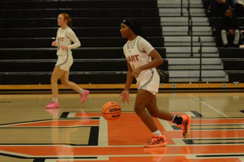 Sophomore guard Jaycee Wiley dribbles the ball up the court in the 45-43 win over Athens Academy on Dec. 10.