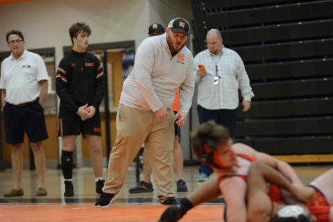 Mat Dogs head coach Sam Simpson coaching during a match back on Nov. 20.