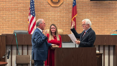 Judge J. Christopher NeSmith (left) was sworn in as a judge on the Superior Court of the Northern District of Georgia Dec. 20. NeSmith was sworn in by retired Chief Judge John Bailey (right). 