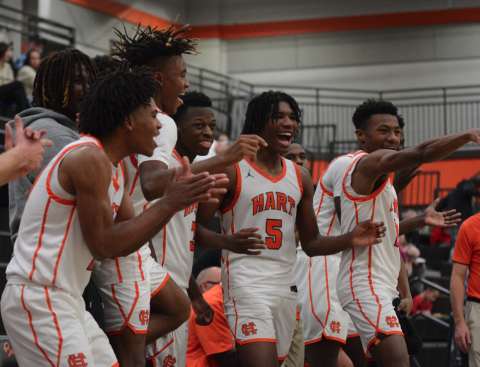 The Dogs bench celebrates after a big three late in 79-52 win over Pendleton as they would then go onto defeat Elbert County, 69-57 to win the McDonald’s Shootout Championship.