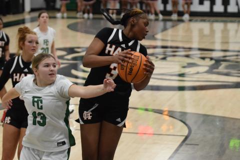 Junior forward Kiasia Montgomery reels in one of her eight rebounds in the 68-51 loss to Franklin County on Jan. 14 in the Lion’s Den. Photo by Shane Scoggins/Franklin County Citizen Leader.