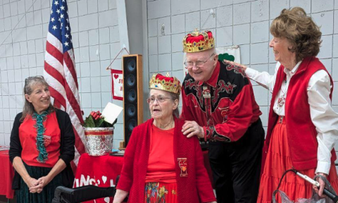 Bob and Lorrie Morrison were crowned the “King and Queen of Square Dance” by Sheryl Cantwell (right), Lorrie Morrison (left) and the Swingin Harts Square Dancers of Hartwell for their 25 years of calling dances for the club. 