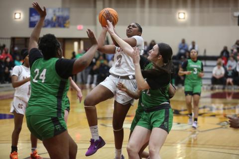 Junior forward Kiasia Montgomery led the way for the Lady Dogs as she scored 25 points against the Lady Lions of Franklin County to advance to the Region 8-AA Championship.