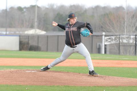 Sophomore pitcher Landry Carter winds up to pitch as he pitched two innings allowed one earned run and punched out four batters in the 6-5 win over Jefferson.