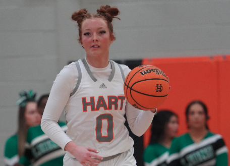 Senior guard Channing Segars dribbles the ball across the timeline in the 54-38 win over Franklin County. Photo submitted by DJ Groves.