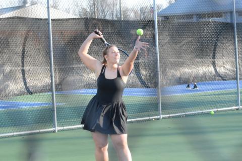 Adah Grace Johnson prepares to serve in the 5-0 loss to Stephens County on Feb. 27.
