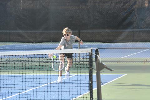 Ayden Mercer returns a serve in the 5-0 loss to Stephens.