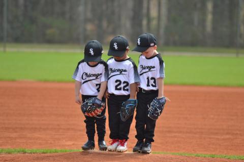 Hart County Little League held its annual Opening Day Saturday, March 15 at the Hart County Recreation Department. The morning include the parade of teams, Hart County High School softball player Kinsley Duncan throwing the first pitch and a day full of first games. Left, (L-R) Reeves Parker, Zachary Wood and Charlie Ray all look for a spot on the pitcher’s mound during a Chicago White Sox game. (Photo/Kenyon Harris)