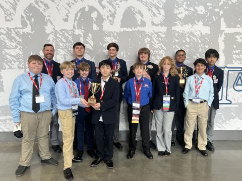 Pictured are the Hart County Middle School TSA students who recently attended the 2025 Georgia TSA State Conference: (front row, L-R) Easton Saylors, Nathaniel Metzger, John Bryant, Chance Vang, Connor Lewis, Kenzie McDuffie and Steve Franco; (back row, L-R) Joshua McCurley (advisor), Case Cothran, Henley Skelton, Garrett Ray, Jyrese Quillian and Johnson Dang. (Photo/Grayson Williams)
