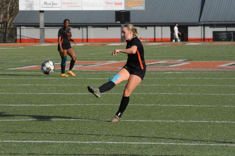 Senior midfielder Teague Pierce pops in a goal from long range in the 10-0 win over the Lady Rams of Monsignor Donovan on March 14. (Photo/Benjamin London)