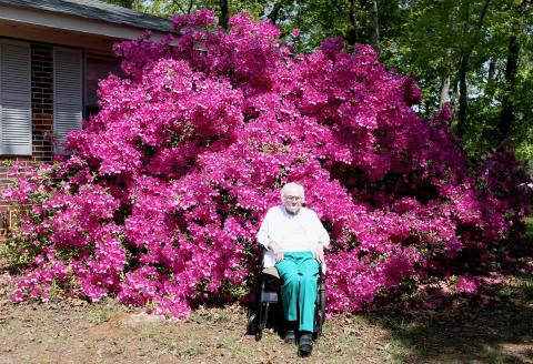 Sylvene Fleming (above and below), who turned 99 on Tuesday, sits in front of a huge azalea bush on the side of her home off of Old Highway 29 on Thursday, April 10. She planted the flowers a few years after moving there in 1956. (Photo/Rose Scoggins)