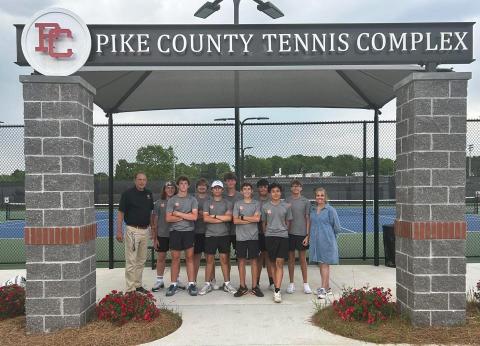 Pictured is the Hart County High School boys tennis team as they celebrate after their 3-0 win over No. 9 seed Pike County and advance to the Sweet Sixteen. (Photo submitted by Hart County High School)
