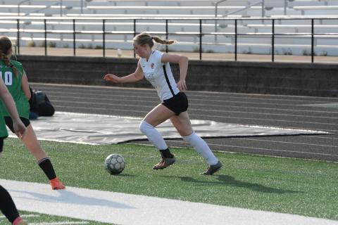 Midfielder Teague Pierce nets the lone goal in the 5-1 loss to Franklin County on March 28. (Photo/Benjamin London)